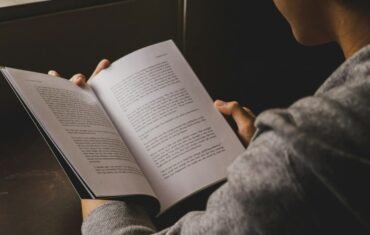 CBSE student studying NCERT textbook for exam preparation