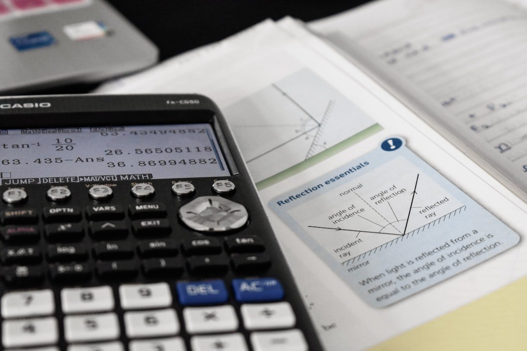 Class 10 Maths student studying mathematics with calculator and textbook