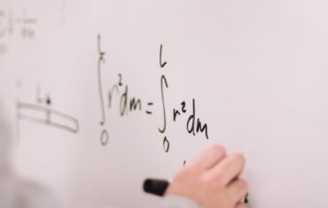 Class 11 student studying Maths and Science at home