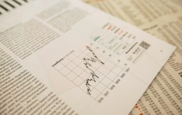 Class 12 Economics study with economic charts and finance material