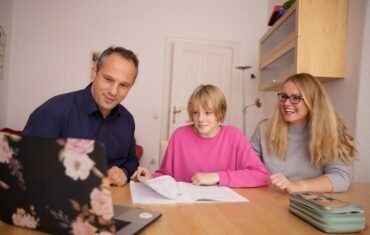 Family supporting a child's education and home study routine