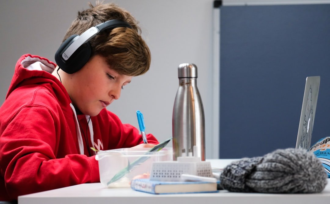 Student learning Physics online from home with a laptop