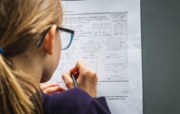 Student studying school Physics lessons at home