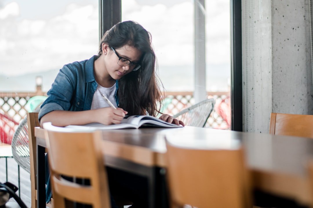 Class 10 English student studying with a book and notes