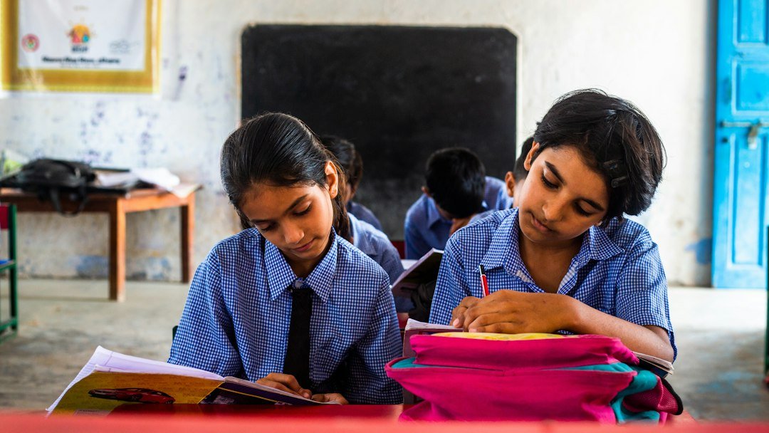 Class 10 student preparing for CBSE board examinations with study material
