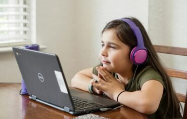 Online French tuition student learning with tutor